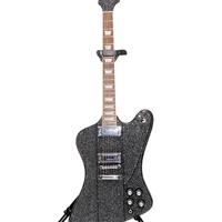 Gibson_Firebird_electric_guitar_with_black_Swarovski_crystals_played_by_Shakira_at_Superbowl_LIV.jpg