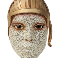 Mask_on_the_back_of_her_head_for_song_Whenever_Wherever_on_El_Dorado_tour.jpg
